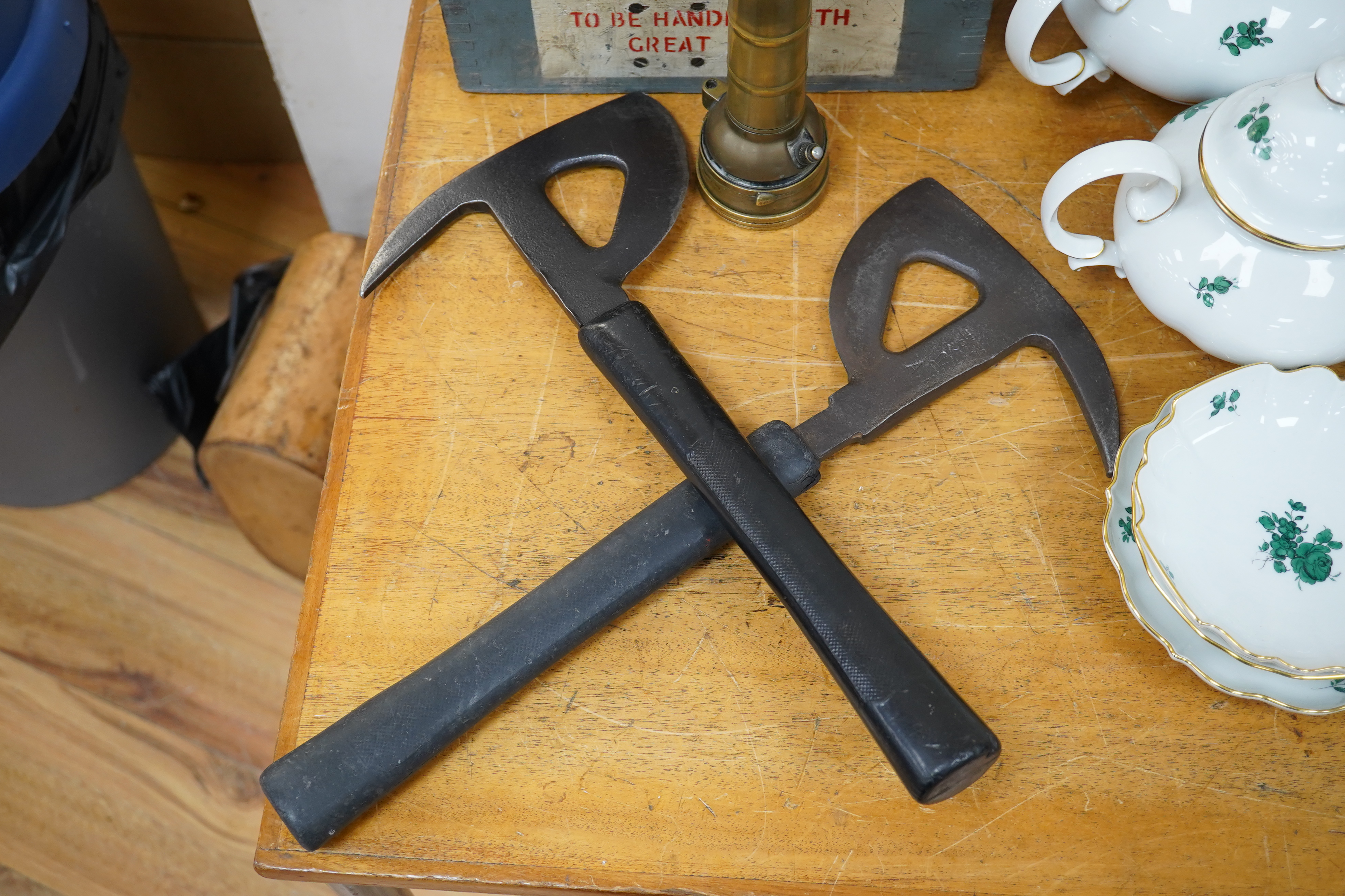 Two WWII RAF Air Ministry aircraft escape axes, one stamped; Elwell 1943, a cased Astro Compass Mk.II, and a brass Air Ministry signalling torch. Condition - fair to good.